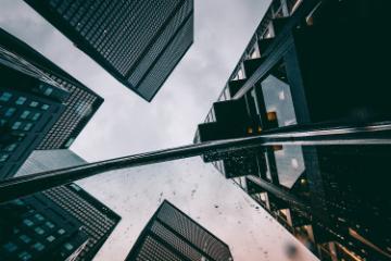 looking up at buildings and sky